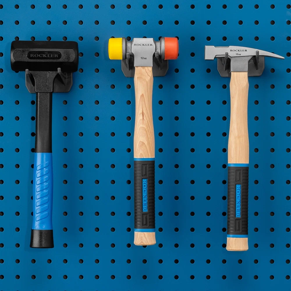 Hammers on a pegboard wall