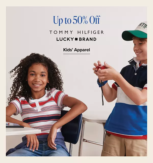 Up to 50% off. Shop Kids apparel. Tommy Hilfiger. Lucky Brand. A group of kids in a classroom.