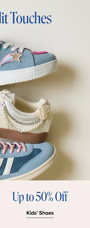 Up to 50% off kids shoes. Shop now. Various pairs of sneakers.
