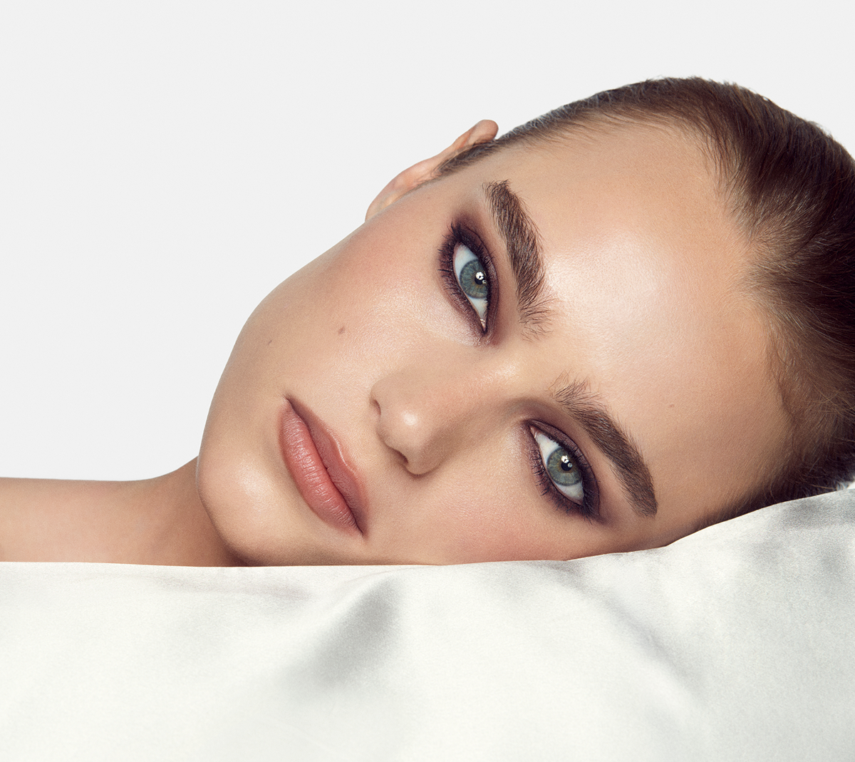 Close-up of a model with graphic black smokey eyeliner.