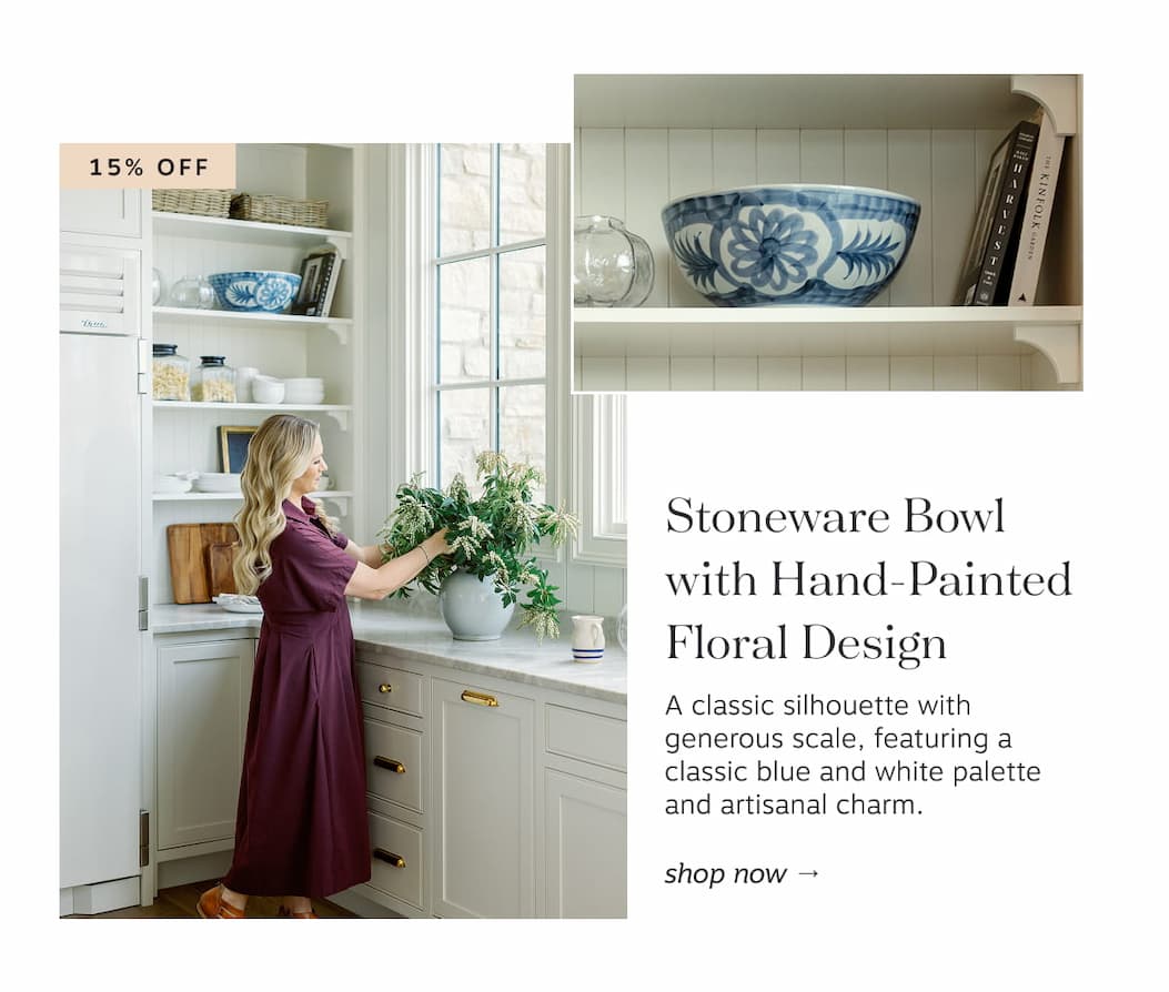 Stoneware Bowl with Hand-Painted Floral Design: A classic silhouette with generous scale, featuring a classic blue and white palette and artisanal charm. Shop now
