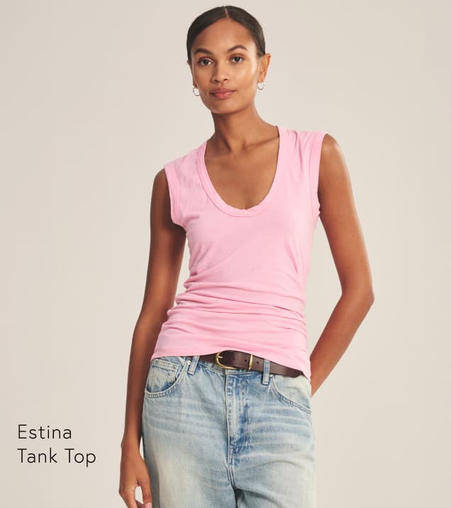 Image shows a model wearing the Estina Tank Top in Sherbert.