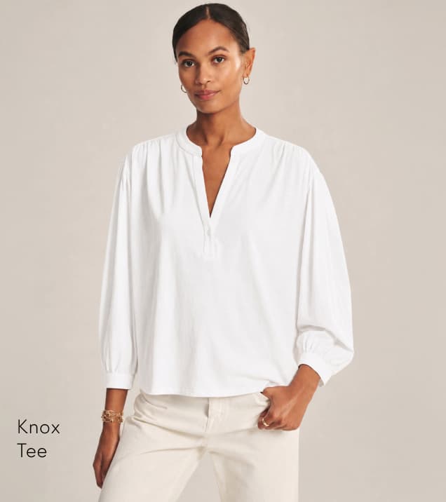 Image shows a model wearing the Knox Tee in White.