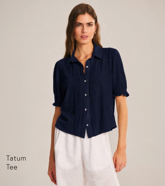 Image shows a model wearing the Tatum Tee in Navy.