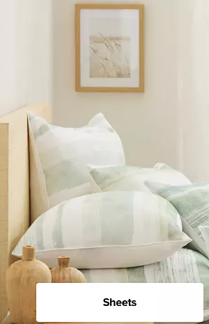 An image of a bedding set. Refreshed and ready.  Shop sheets.