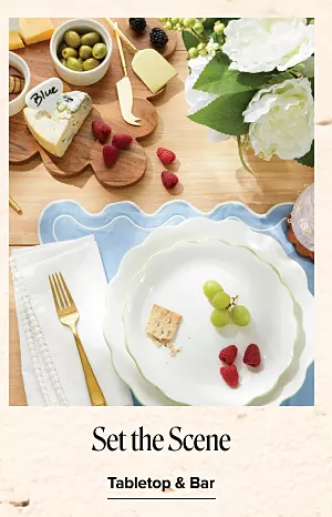 Dinnerware on a table. Set the scene. Tabletop and bar.