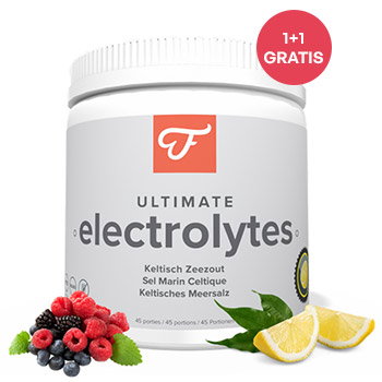White tub of Ultimate Electrolytes powder (mixed berry and lemon) with berries, lemon slices and '1+1 gratis' badge