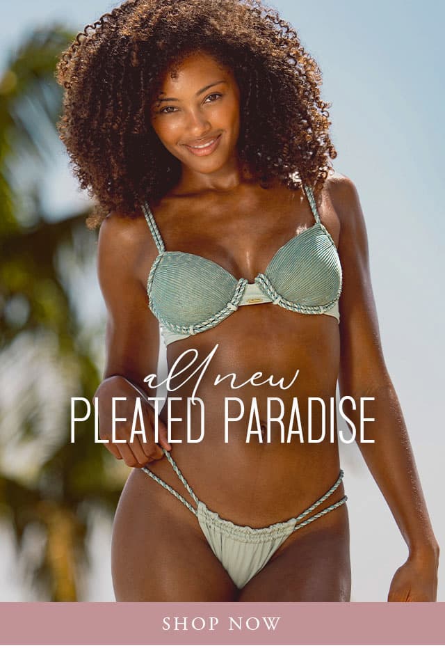 Model wearing a sage green pleated underwire bikini. "Pleated paradise" Shop now. 