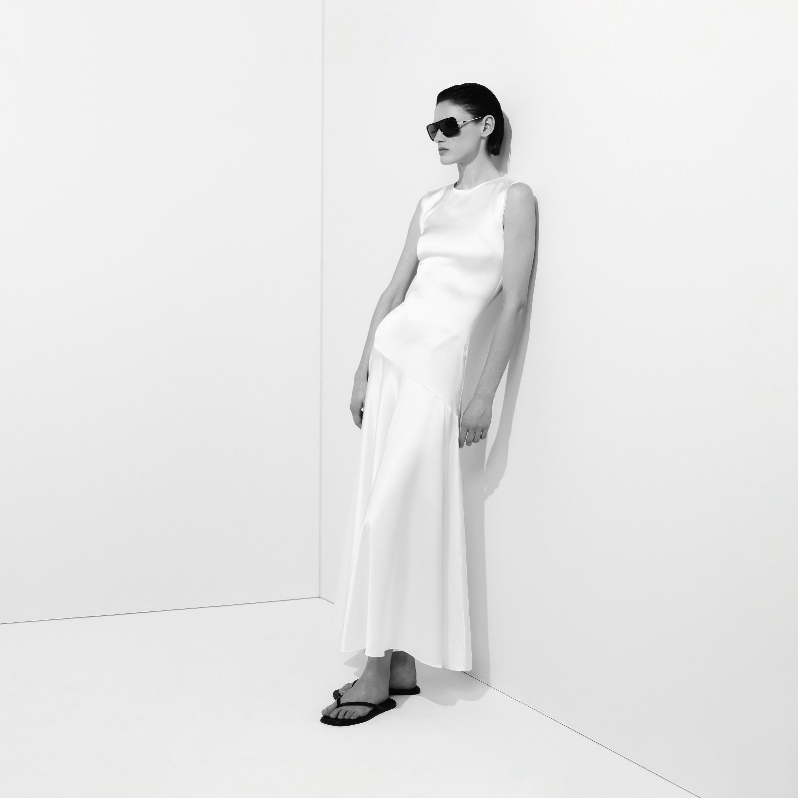 Editorial image of a model wearing the gwenyth dress in ivory