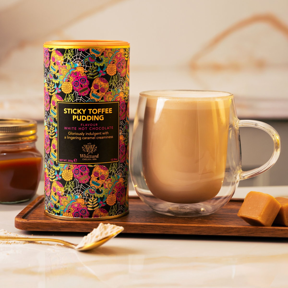 Image of Sticky Toffee Pudding tub with made up drink in nova glass