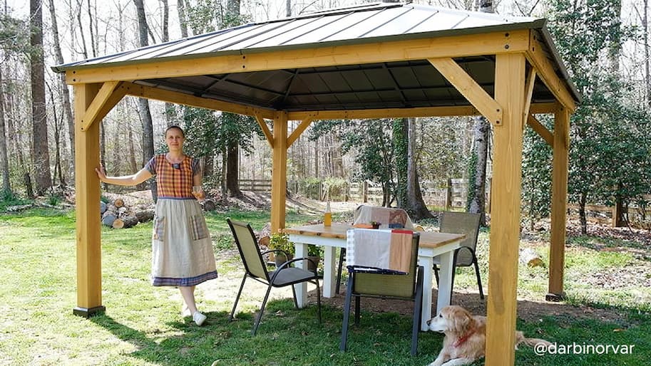 sunjoy pergola in backyard