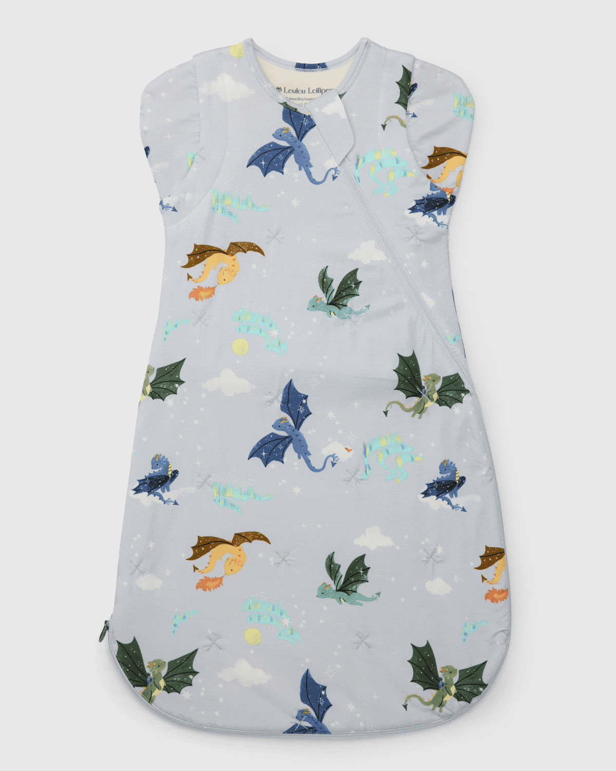 gif showing a blue dragon printed swaddle wrap opening and closing
