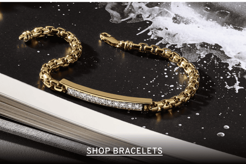 A men’s gold and diamond chain bracelet. Click to Shop Bracelets