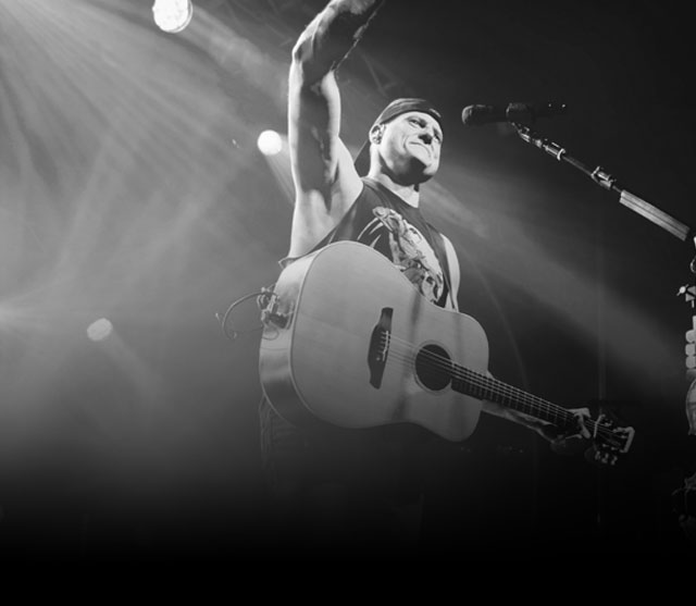 Chris Higbee performing wearing Double-H boots. Shop Double-H boots. 