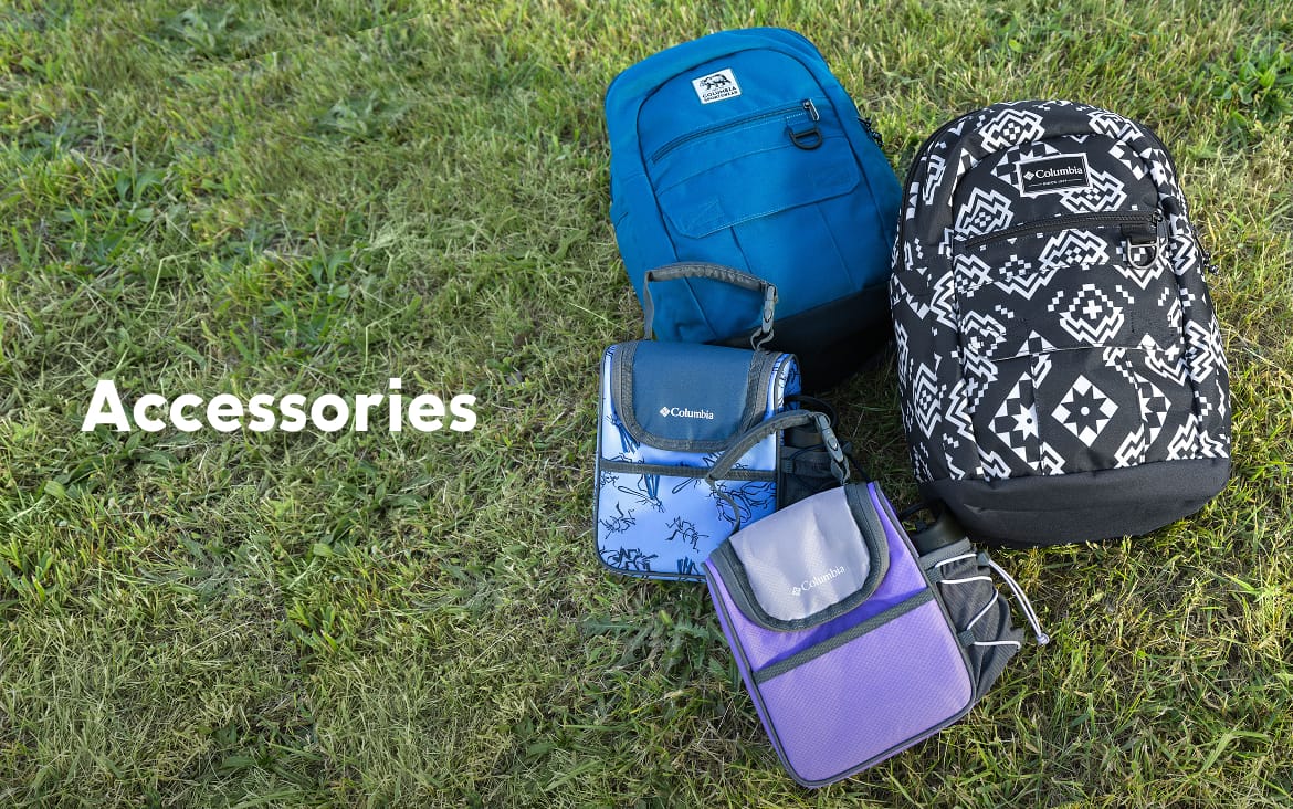 Backpacks and lunch boxes on grass with text: Accessories