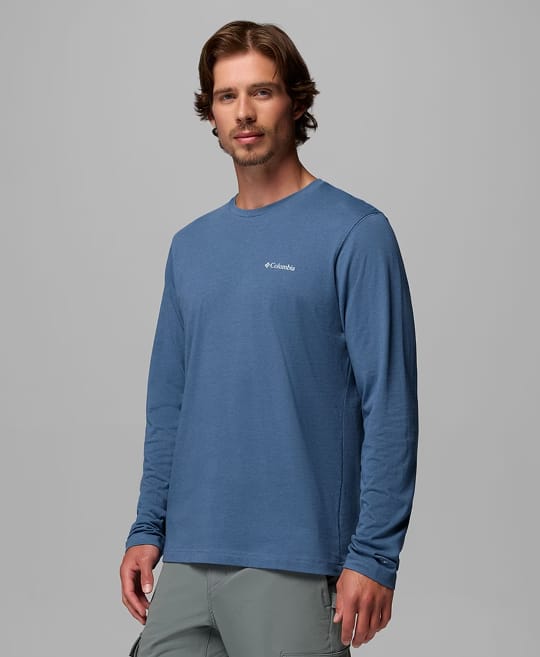A man wearing a blue long sleeve shirt.