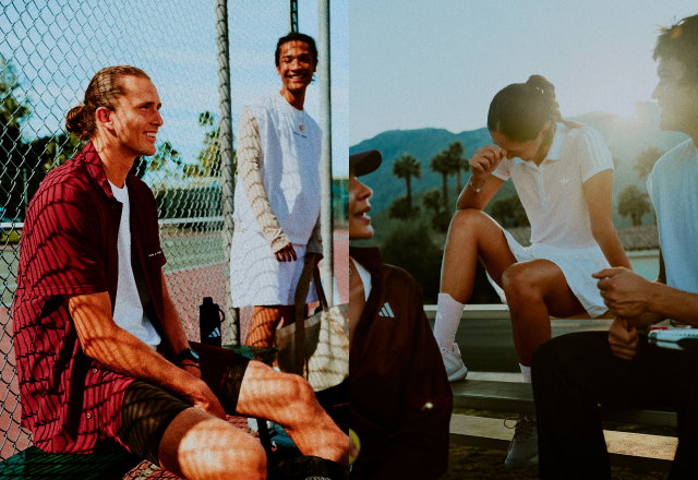 Un groupe de joueurs de tennis en train de rire pendant une pause sur le court, portant des pièces des collections adidas Classics et New York Tennis.