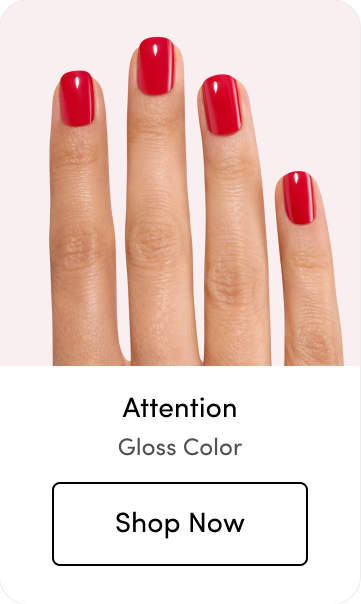 Hand with red gloss nail polish, labeled 