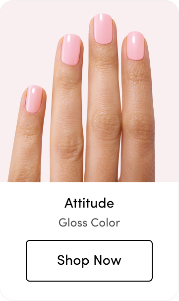 Hand with light pink gloss nail polish, labeled 