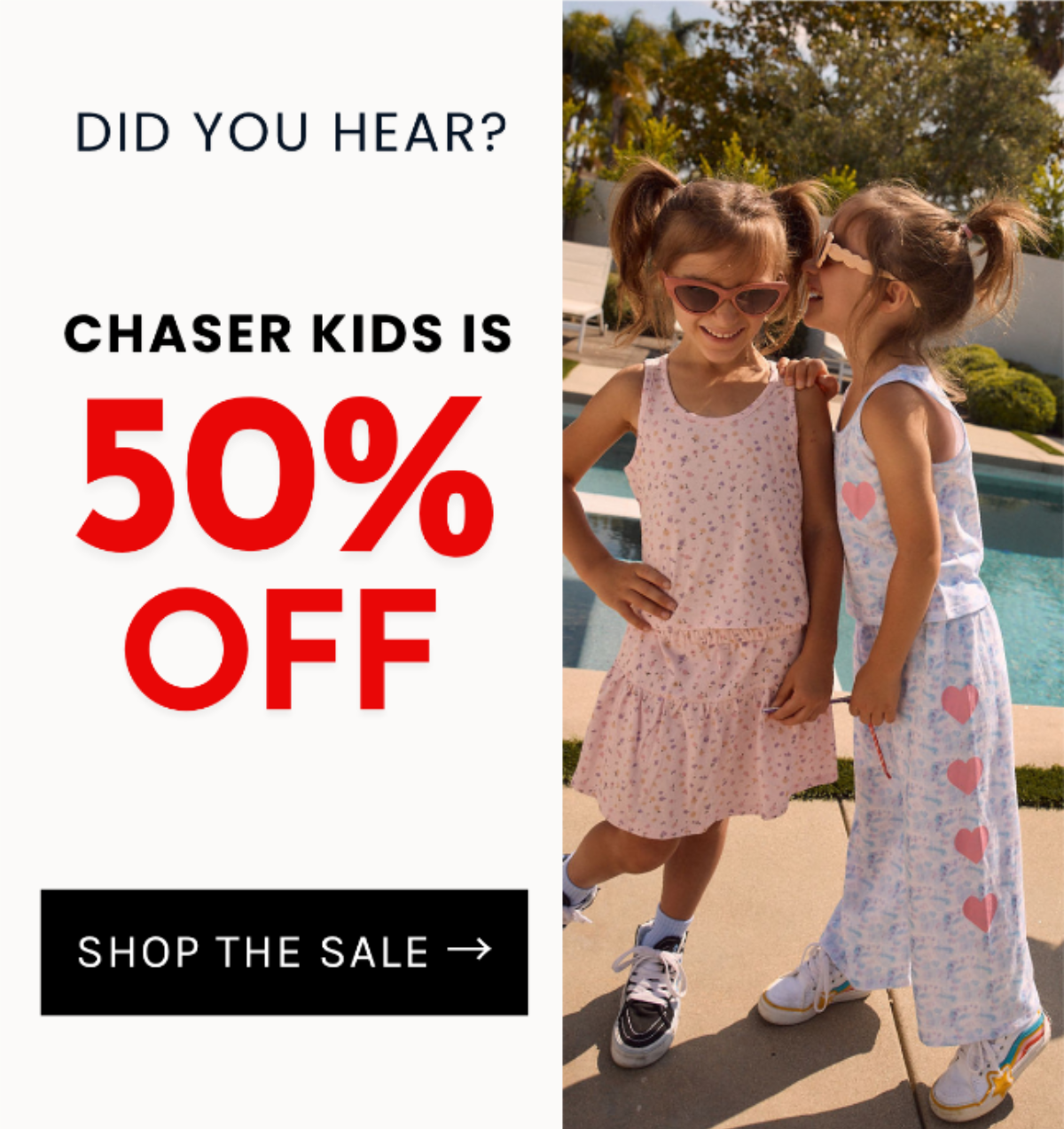 Two girls in colorful Chaser Kids outfits and sunglasses smile at each other at a skatepark for the final weekend of the 50% off sale