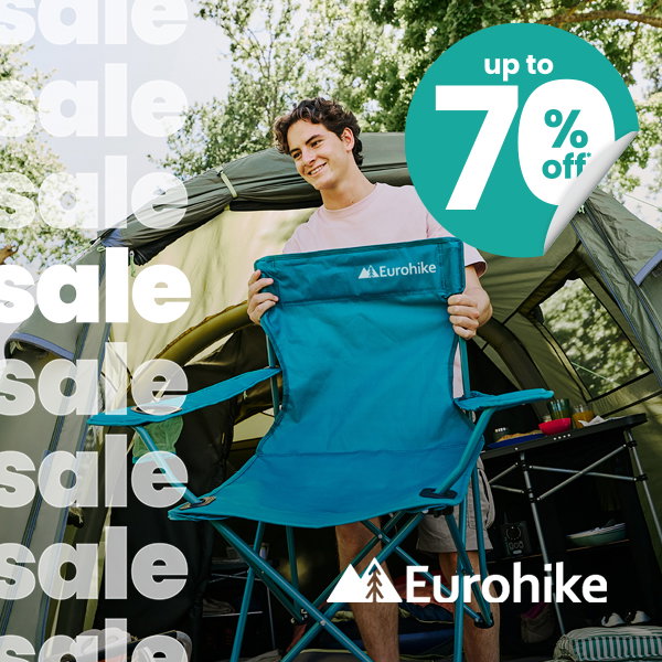 Person standing in front of a camping tent holding a blue Eurohike folding camping chair. Promotional graphic includes repeated “sale” text, Eurohike logo, and “Up to 70% off” badge.