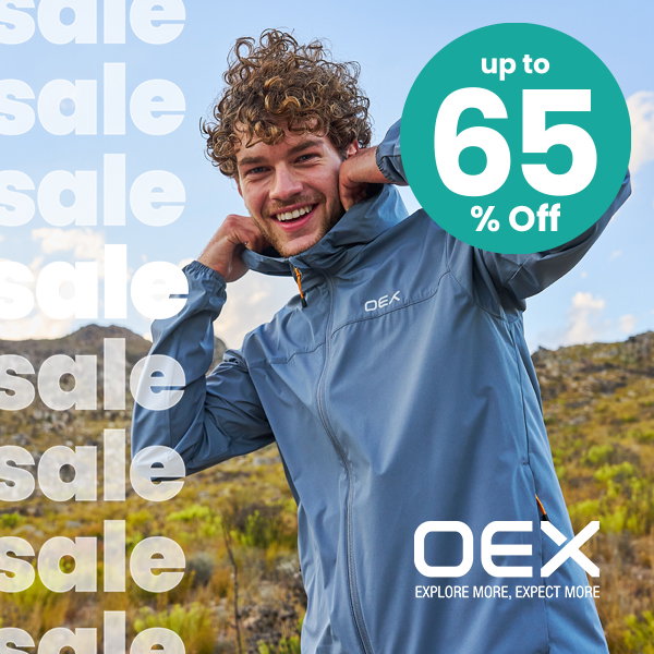 Person wearing a blue OEX waterproof jacket outdoors with hills and sky in the background. Promotional graphic includes repeated “sale” text, OEX logo and slogan, and “Up to 65% Off” badge.