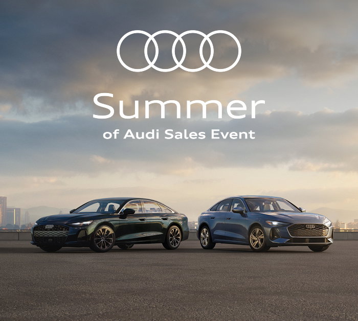 Green Audi A5 and blue Audi A6 parked before a vanilla sky. Summer of Audi Sales Event. Find yours.