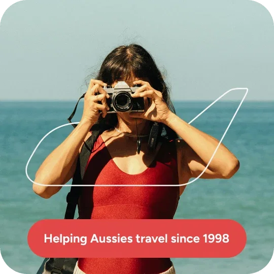 Person with a camera taking a photo