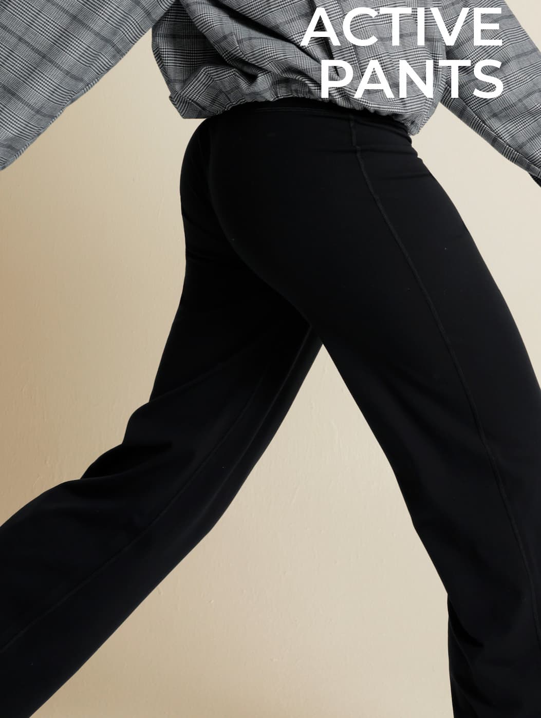 Close-up of the All Day Active Pant in motion, text reads "Active Pants."