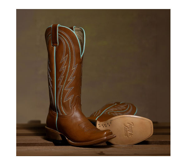 The Hallie Tony Lama boot on a wooden floor.