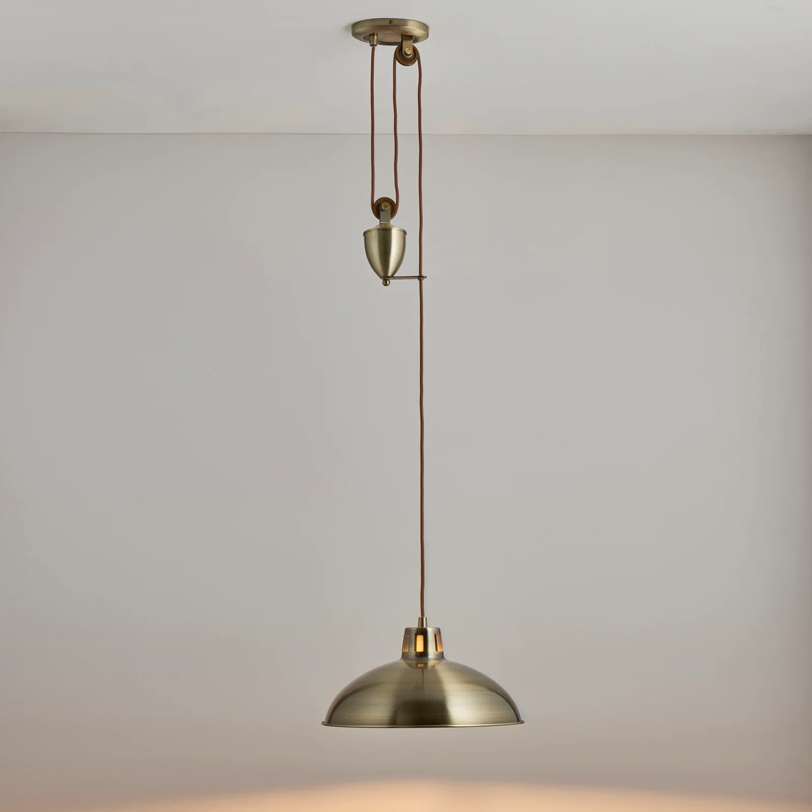 Image of Polka Rise & Fall Pendant Antique Brass