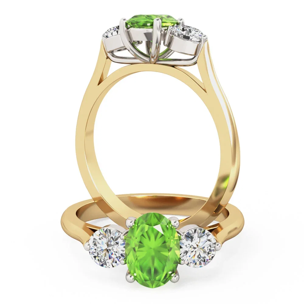 Image of A beautiful peridot & diamond three stone ring in 18ct yellow & white gold