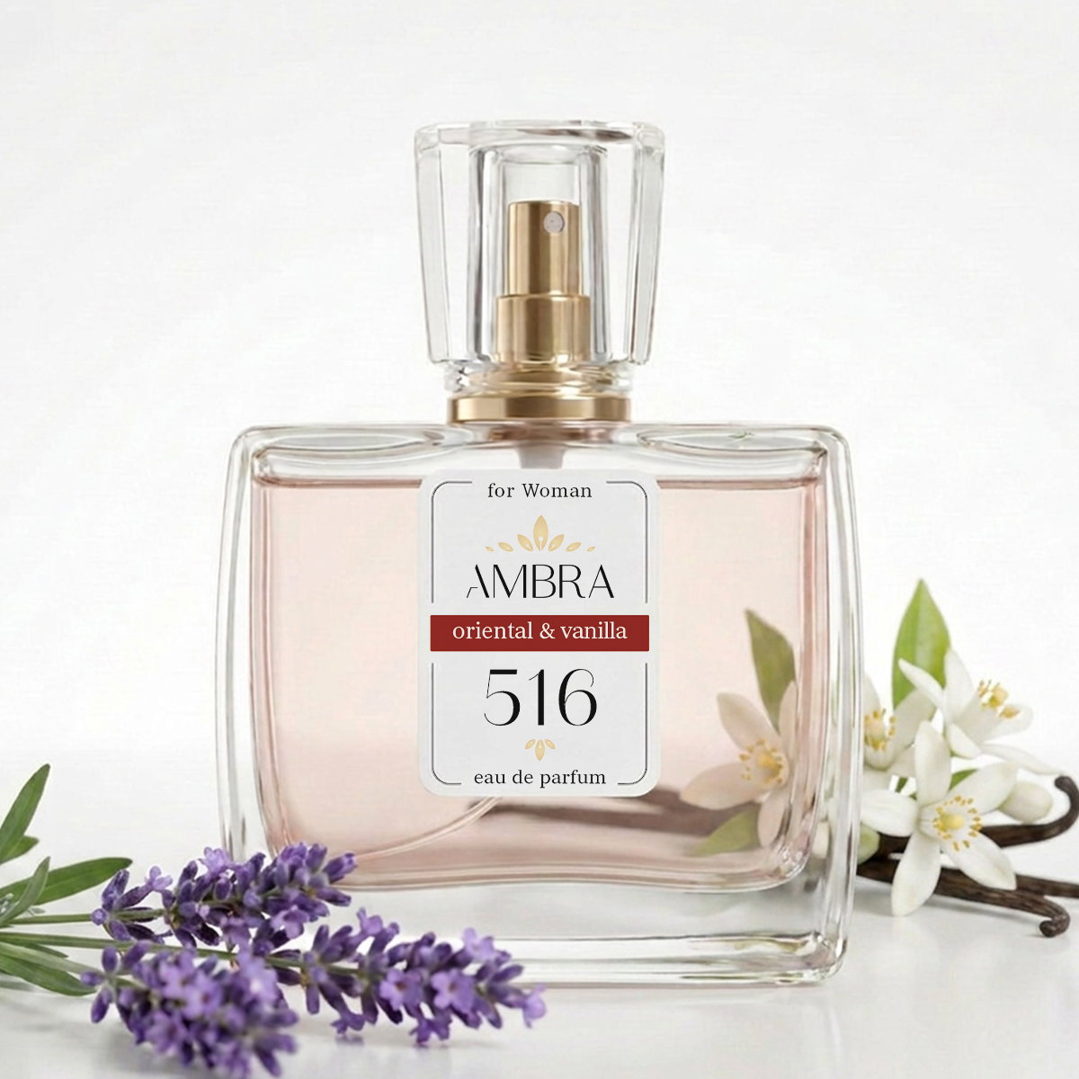 Glass bottle of AMBRA 516 eau de parfum (oriental & vanilla) on white background with lavender sprig and vanilla blossoms