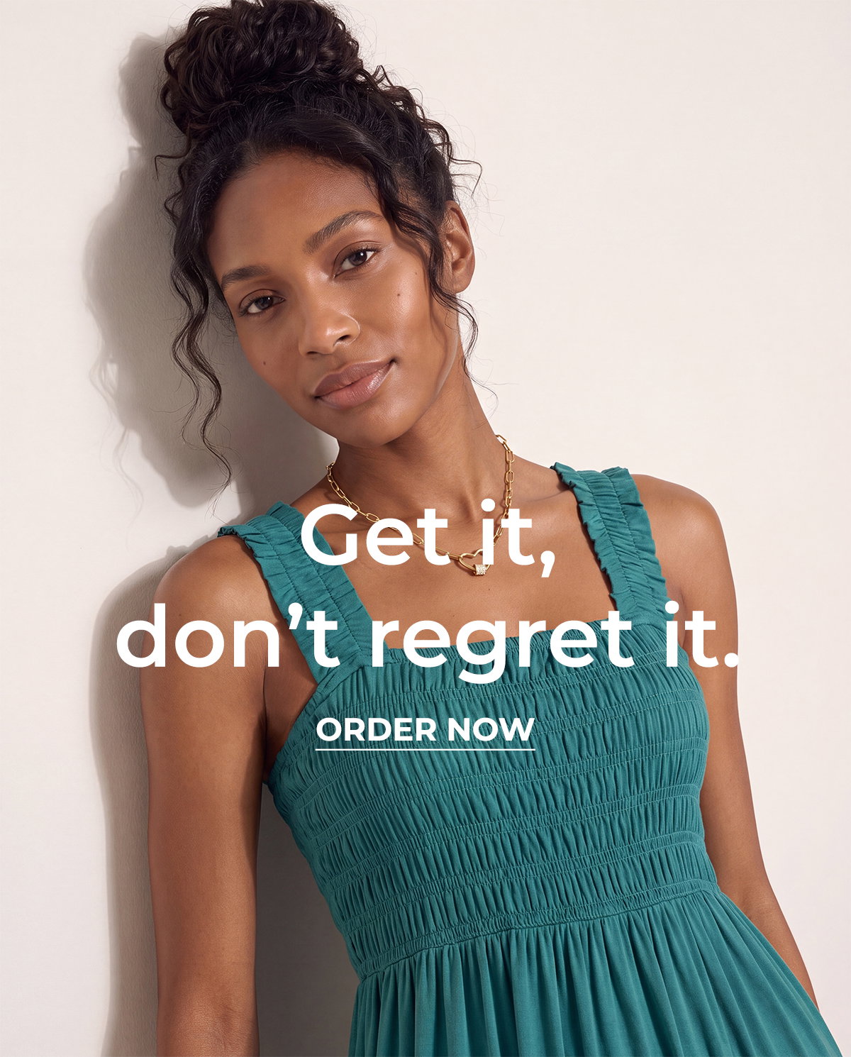 Folded summer clothing in bright colors and patterns for an End of Season Sale.