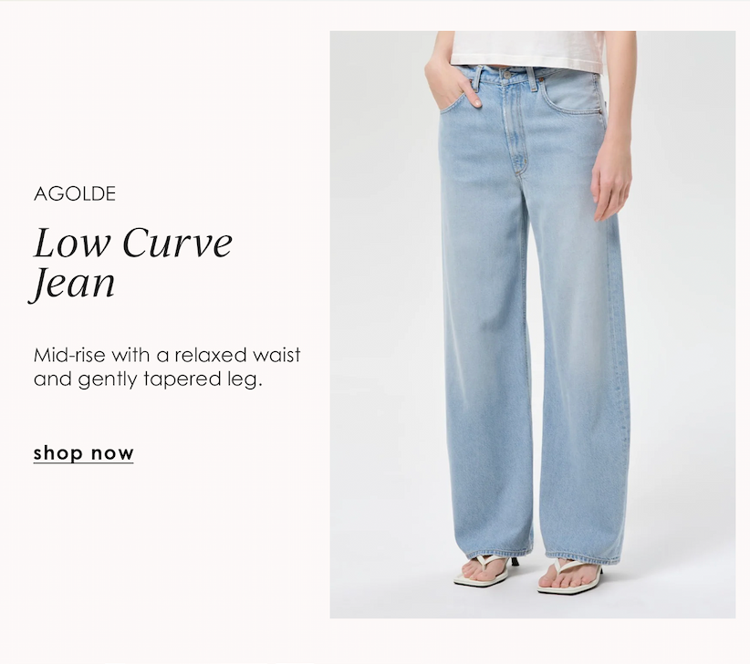 Model wearing light-wash AGOLDE Low Curve Jeans with a mid-rise, relaxed waist, and gently tapered leg.