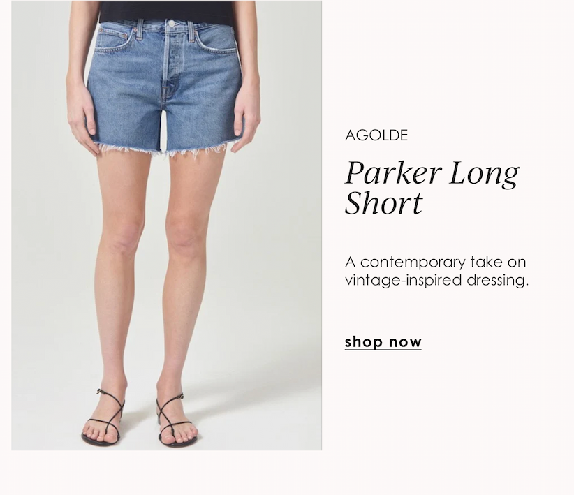 AGOLDE Parker Long denim shorts in a medium wash with a relaxed fit and raw-cut hem.