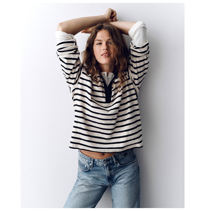 Model in new tee