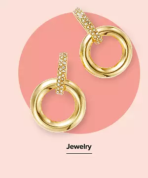A pair of gold earrings. Jewelry.