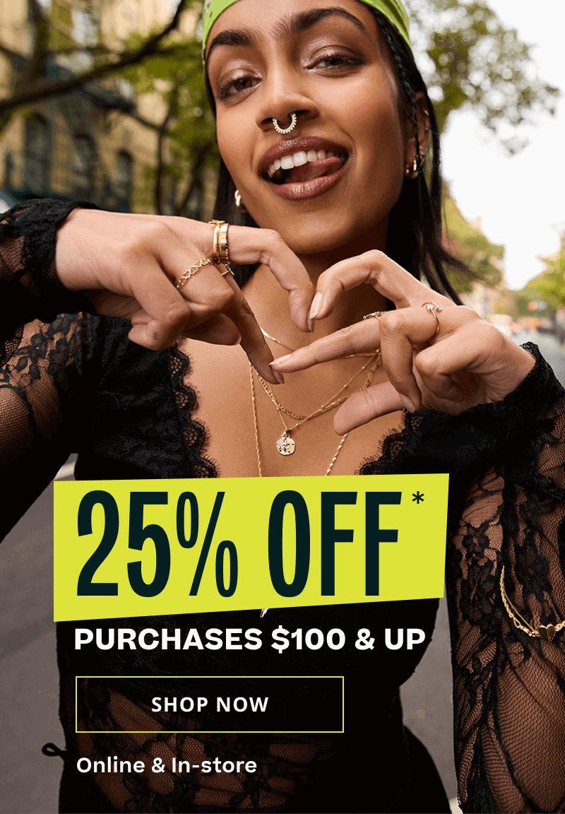 Model with various gold necklaces, rings & ear stack. 25% OFF $100 & up. Online & in-store. Click here to shop now