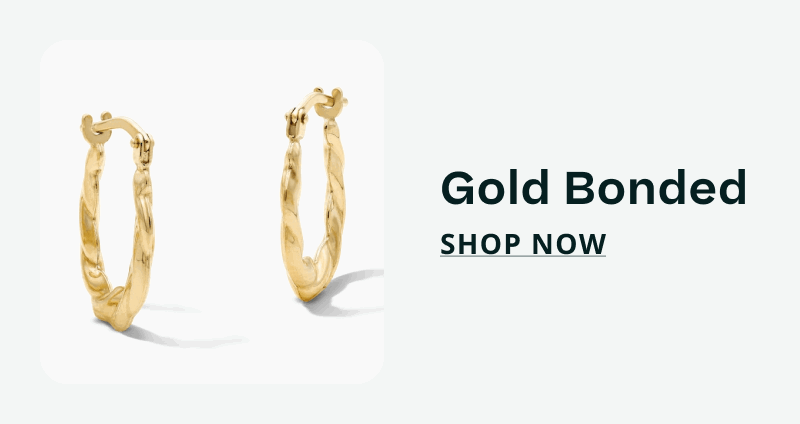Twisted gold textured medium-sized hoops. Gold Bonded. Click here to shop now