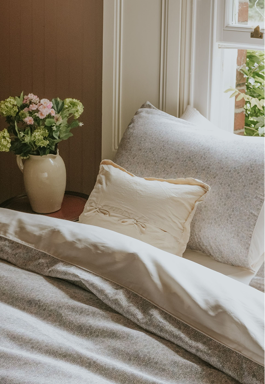 made bed against window