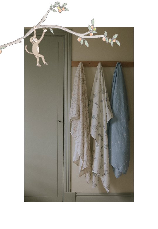 swaddle blankets hanging on rack