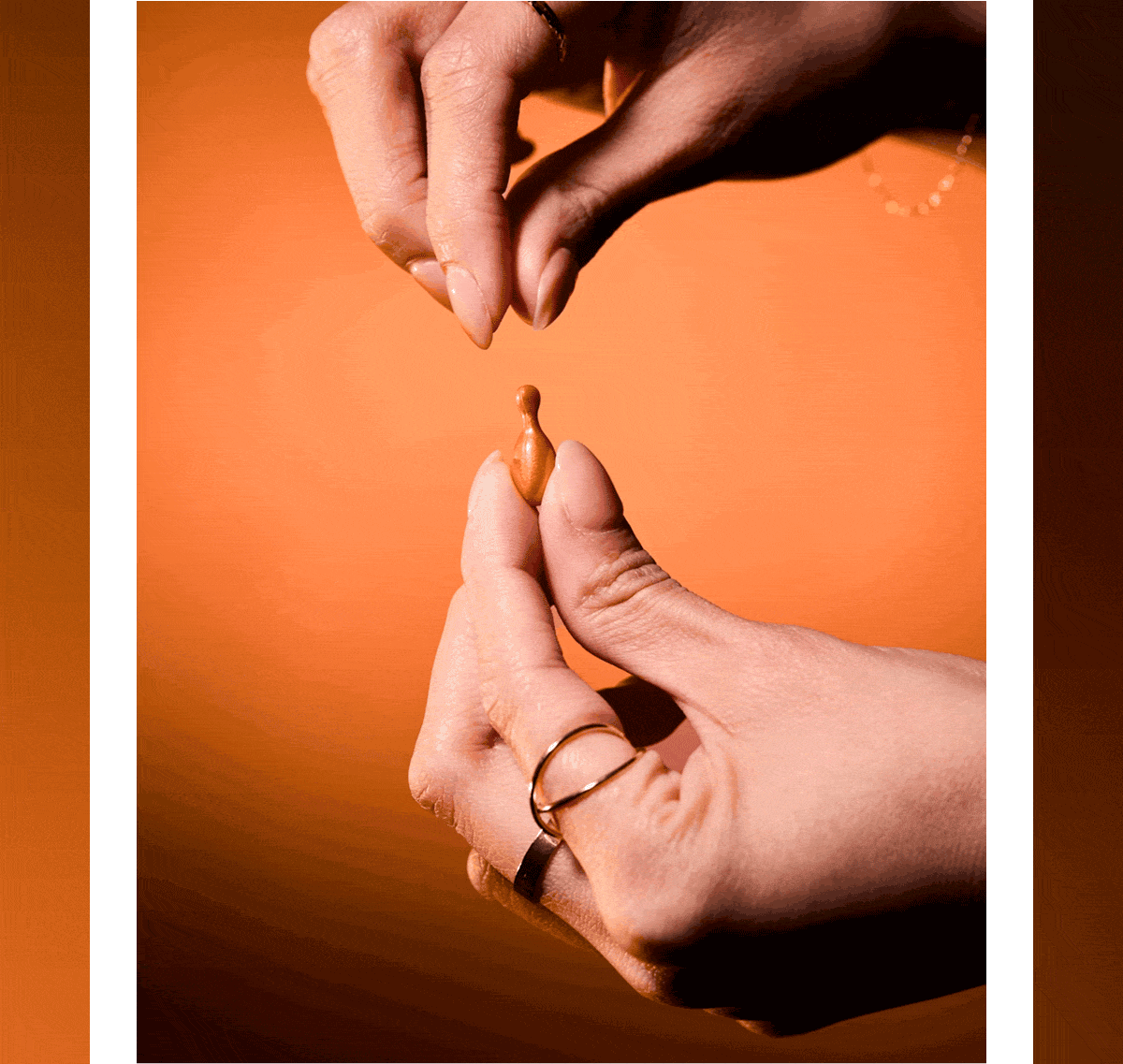 GIF of model applying Power-C Firming and Brightening Serum Capsules.