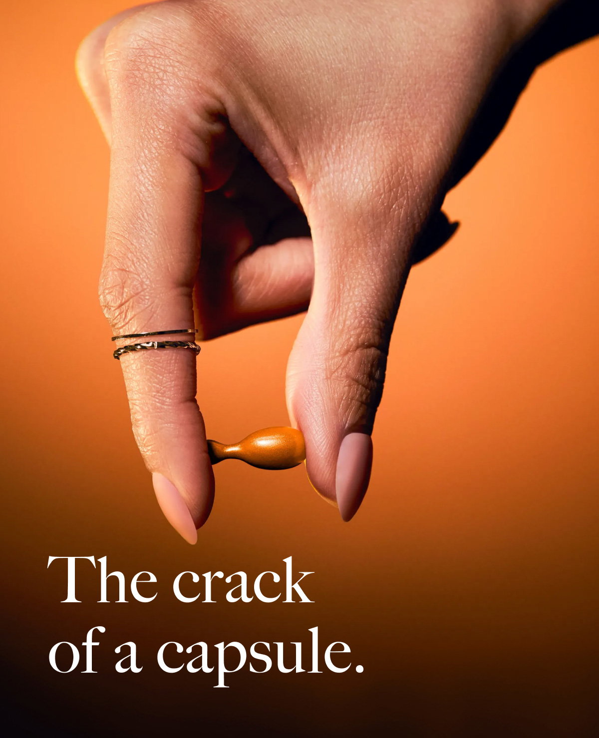 The crack of a capsule.