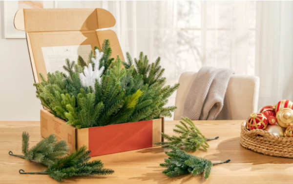Branch Samples in a box, containing curated pieces of Balsam Hill's best-selling artificial Christmas trees