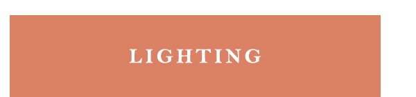 Terracotta rectangular button with white text reading "LIGHTING".