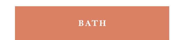 Terracotta rectangular button with white text reading "BATH".