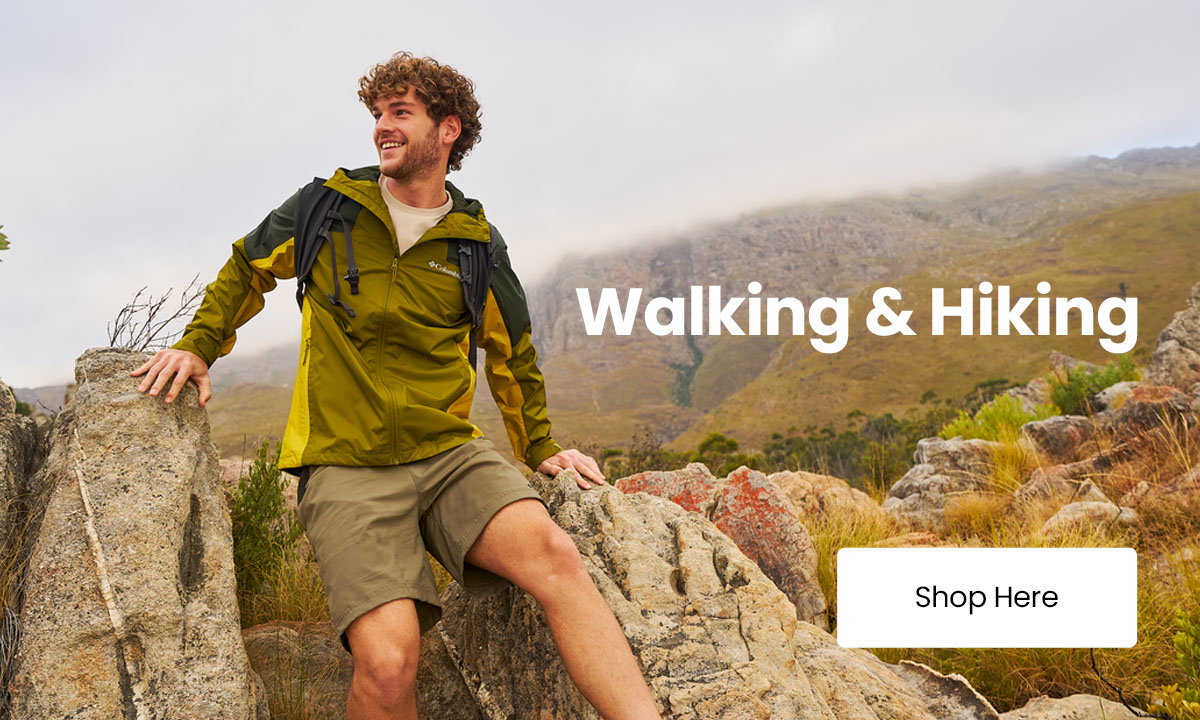 Person in outdoor hiking gear sitting on rocks in a mountain landscape with text reading “Walking & Hiking” and a “Shop Here” button.