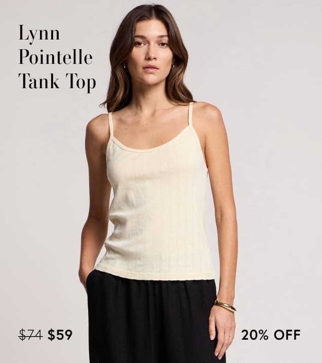 Image shows a model wearing the Lynn Top in Candle.