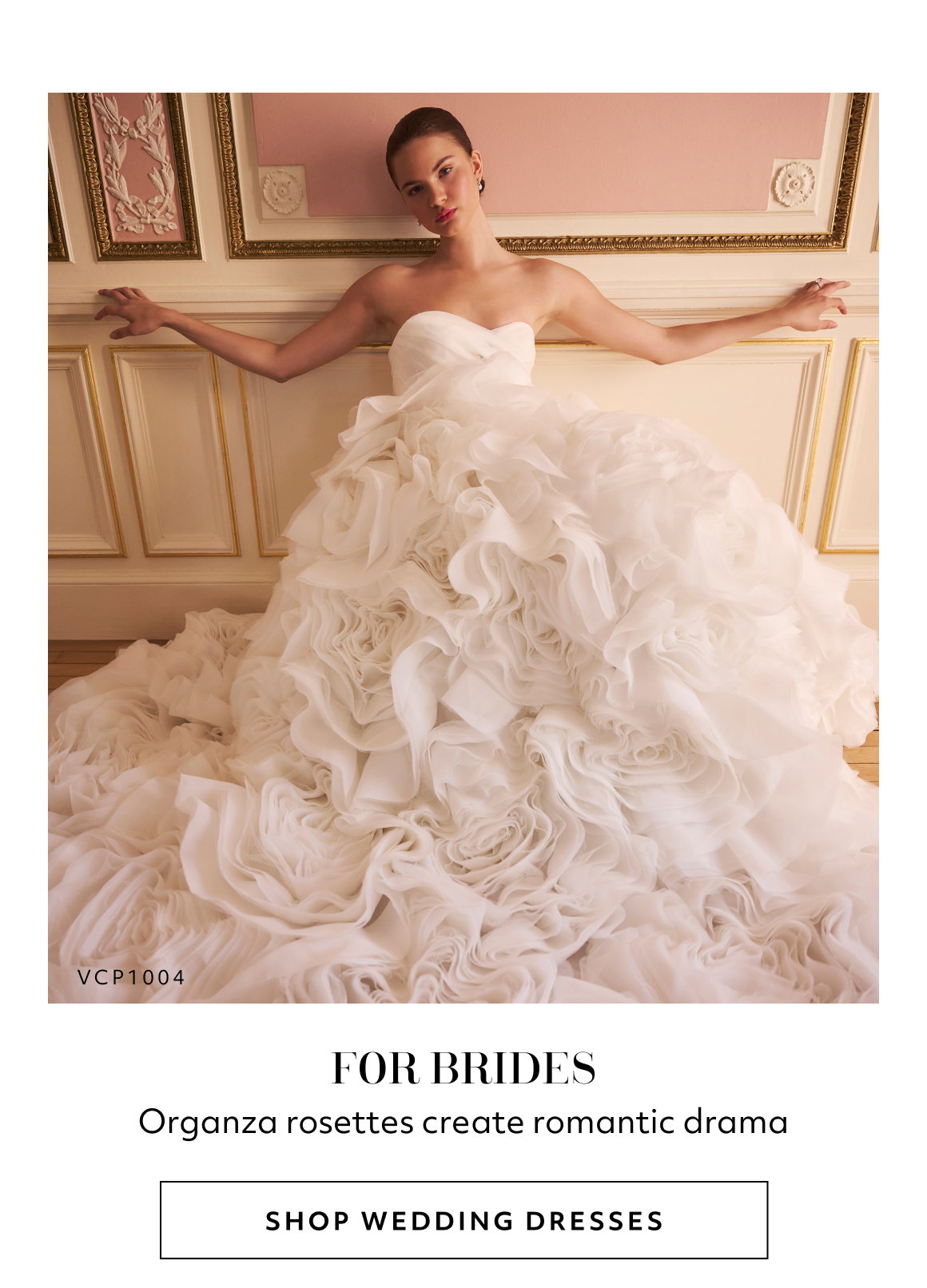 FOR BRIDES. Organza rosettes create romantic drama. SHOP WEDDING DRESSES